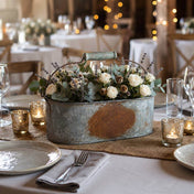 Weathered metal gray caddy used as a floral wedding table centerpiece - thumbnail number 2