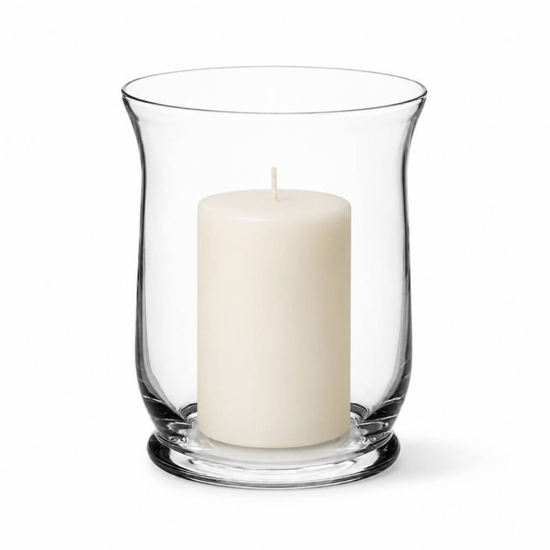 A classic clear glass Hurricane Vase featuring an unlit candle against a white background - thumbnail number 2