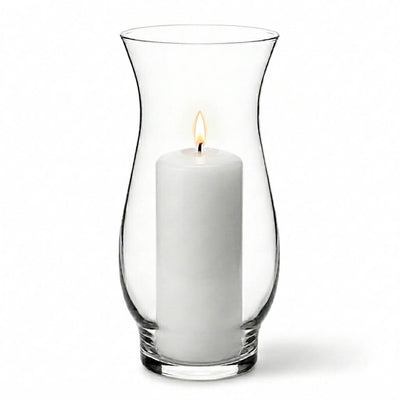 White pillar candle lit inside a clear glass 8.5" hana vase on a white background - thumbnail number 3