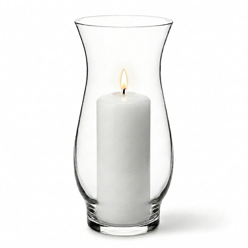 White pillar candle lit inside a clear glass 8.5" hana vase on a white background - thumbnail number 3