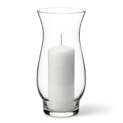 White pillar candle inside a clear hurricane glass vase on a white background - thumbnail number 2