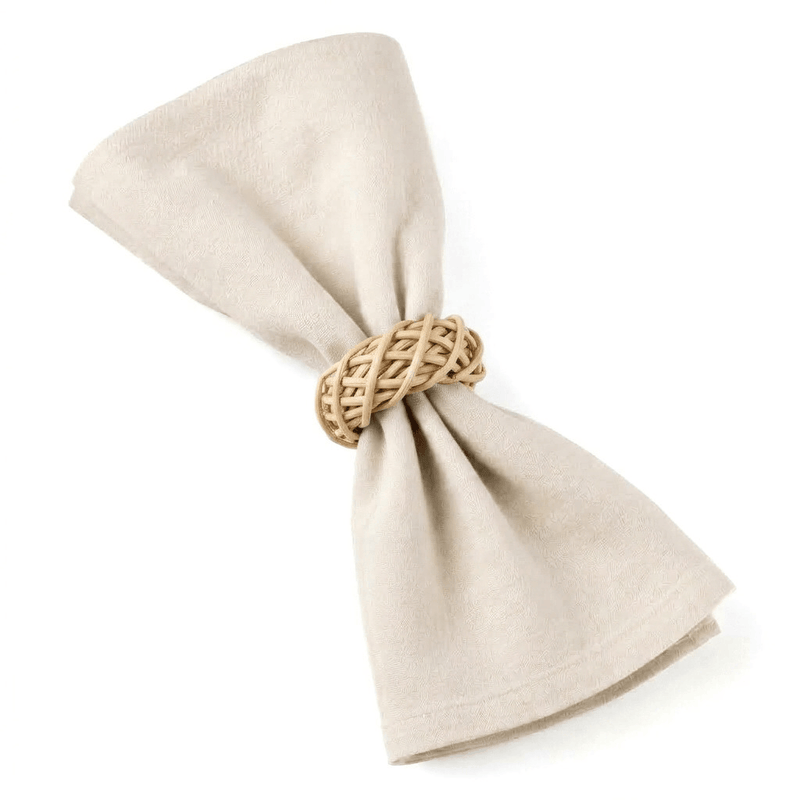 Natural lata napkin ring holding a beige napkin on a white background - thumbnail number 2