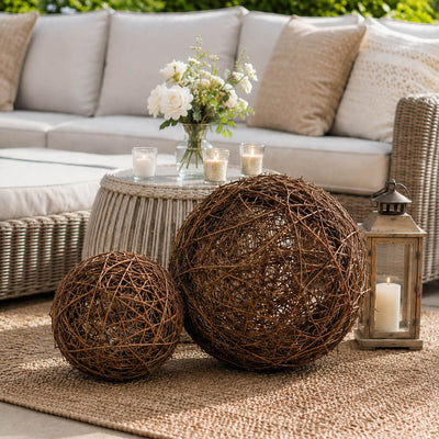 Grapevine topiary balls with a lantern on an outdoor patio - thumbnail number 8