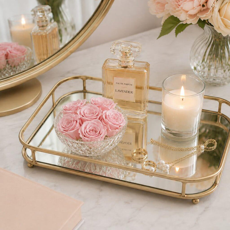 Pink preserved roses in a crystal bowl on a gold mirrored vanity tray - thumbnail number 8