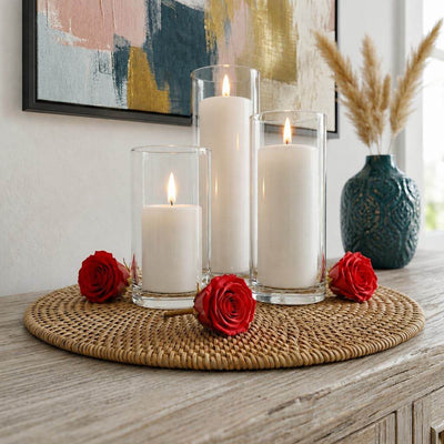 Red preserved roses surround three cylinder candles on a woven tray - thumbnail number 4
