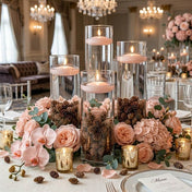 Floating candles in glass cylinders with pine cones and blush flowers - thumbnail number 4