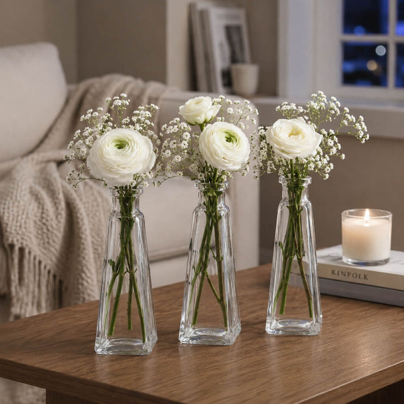 Three 6 oz. pyramid glass bottles with white ranunculus and baby's breath - thumbnail number 6