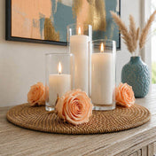 Peach preserved roses surround three cylinder candles on a woven tray - thumbnail number 7