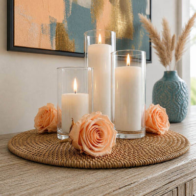 Peach preserved roses surround three cylinder candles on a woven tray - thumbnail number 7