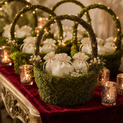 Preserved natural moss baskets filled with white favor bags and fairy lights - thumbnail number 6
