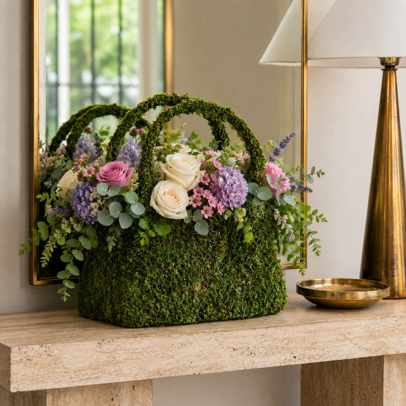 Natural preserved moss purse planter filled with pastel flowers - thumbnail number 7