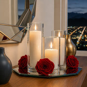 Burgundy red preserved roses surround three cylinder candles on a mirrored tray - thumbnail number 8