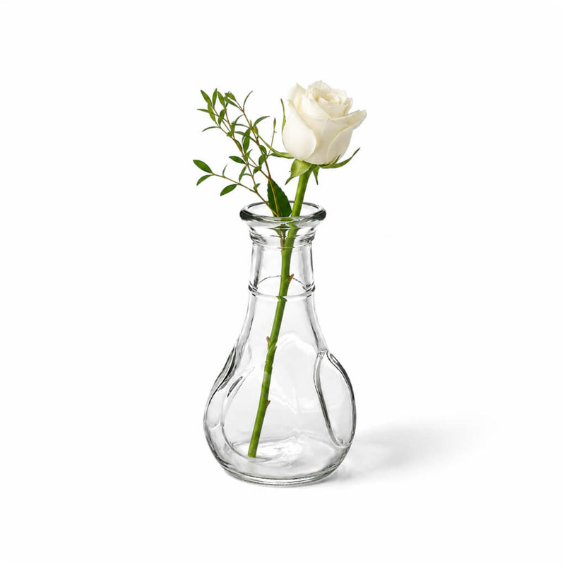 A 3.5" pinched bud vase with a white rose and greenery on a white background - thumbnail number 2