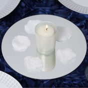 Candle centerpiece with white petals on a mirrored plate - thumbnail number 1