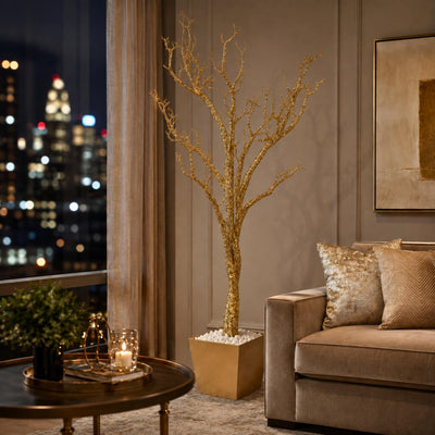 Potted gold faux manzanita tree in a luxury living room at night - thumbnail number 11