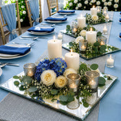 Floral centerpiece with candles and votives on a mirrored tray for a blue table setting - thumbnail number 4