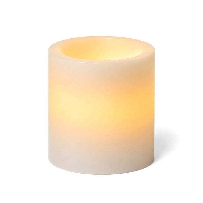 Glowing short flameless pillar candle on white background - thumbnail number 2
