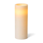 Tall glowing white LED pillar candle on a clean background - thumbnail number 2