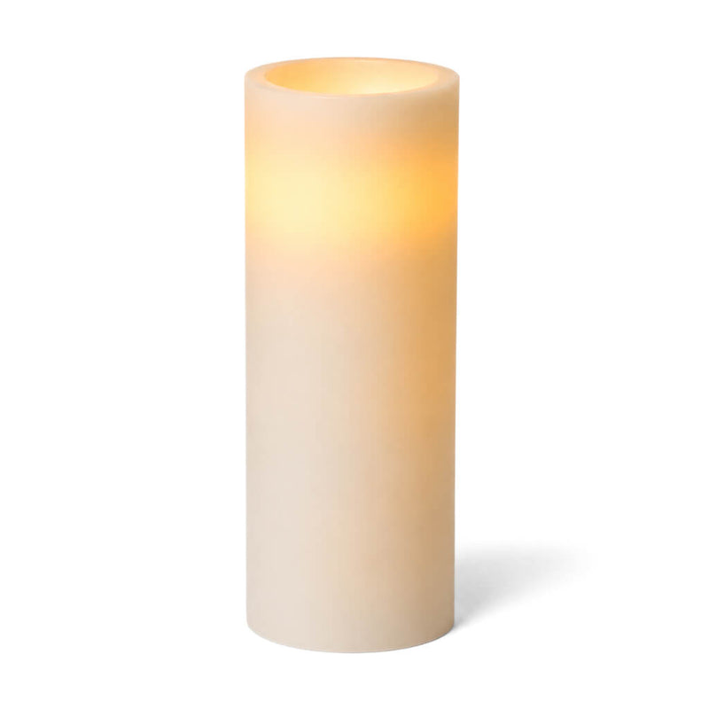Tall glowing white LED pillar candle on a clean background - thumbnail number 2