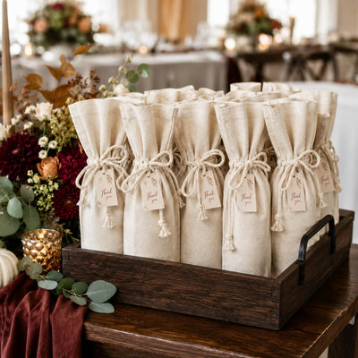 Canvas wine bottle gift bags with Thank You tags in a wooden crate - thumbnail number 3
