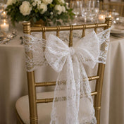 White Chantilly lace sash tied in a bow on a gold chair - thumbnail number 4