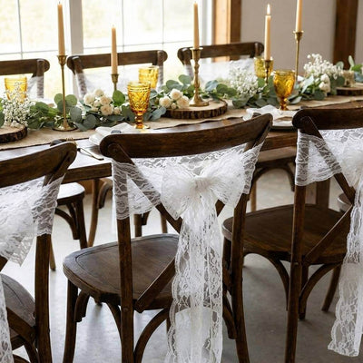 White Chantilly lace sashes tied on wooden chairs - thumbnail number 8