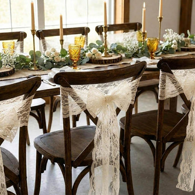 Ivory Chantilly lace sashes tied on wooden chairs - thumbnail number 5