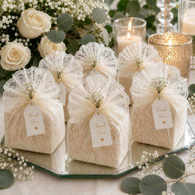 Favors wrapped in white Chantilly lace with thank you tags - thumbnail number 7