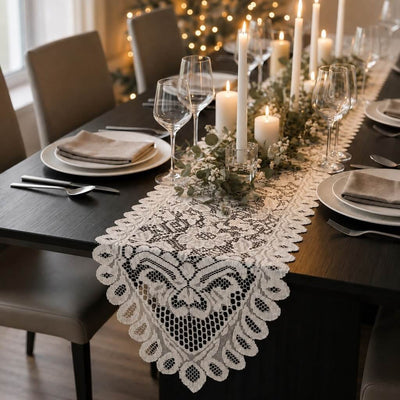White lace table runner on a dining table with candles and greenery - thumbnail number 5