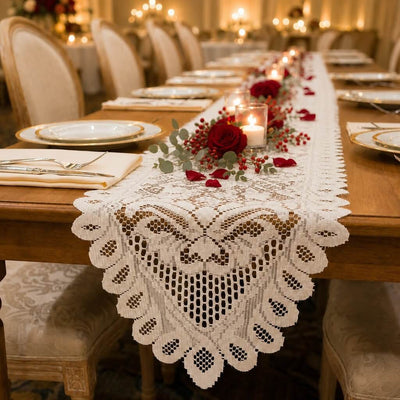 White lace table runner on a dining table with red roses and candles - thumbnail number 6