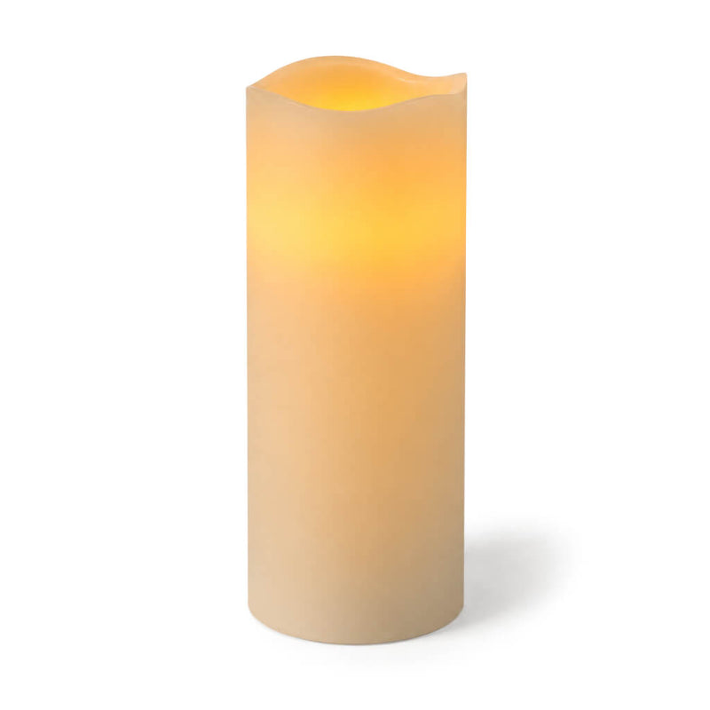 White Flameless LED Wavy Top Pillar Candle with warm glow on white background - thumbnail number 2