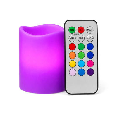 Small purple LED pillar candle with remote on white background - thumbnail number 8