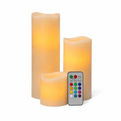 Assorted orange flameless pillar candles and remote on white backdrop - thumbnail number 2