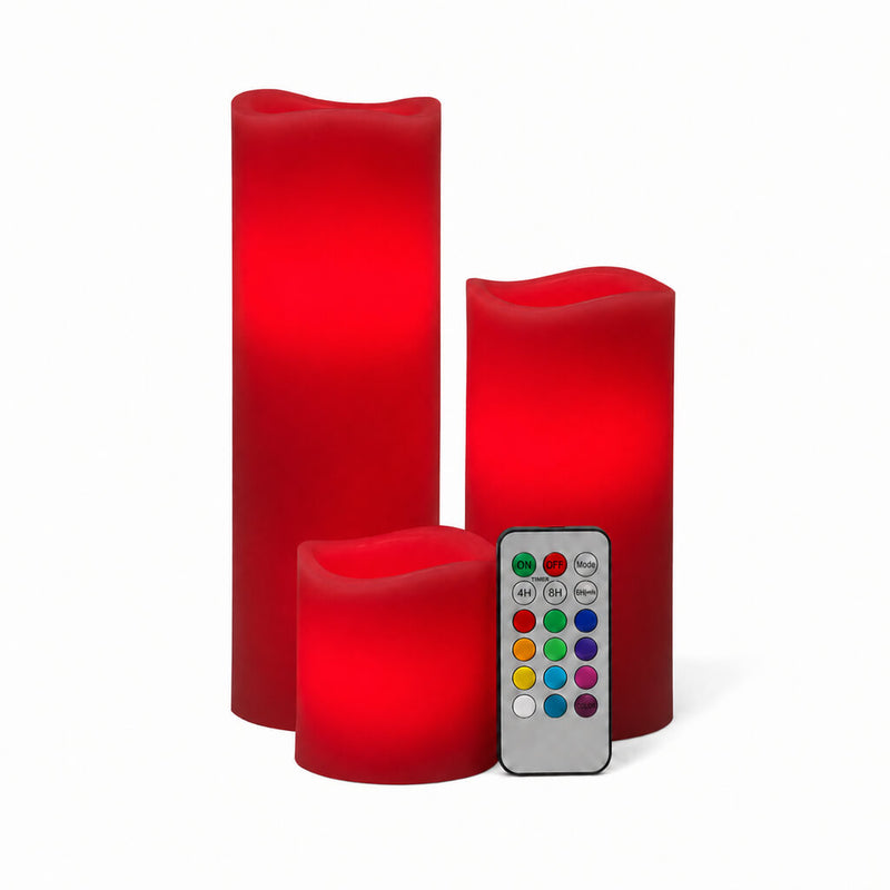 Red LED candles in assorted sizes with remote on white surface - thumbnail number 4