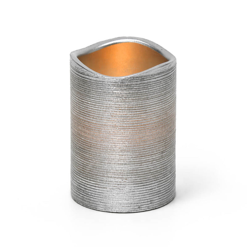 Silver Metallic Wavy Top LED Candle with warm glow on white background - thumbnail number 2