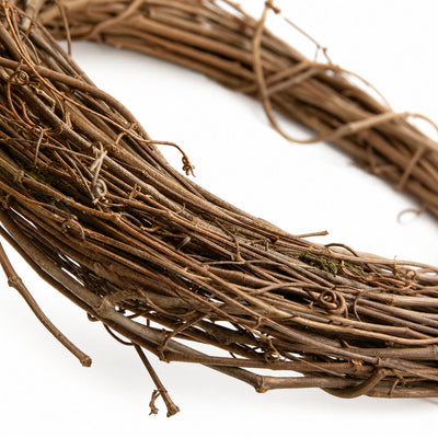 Close up of a natural grapevine wreath on a white background - thumbnail number 2