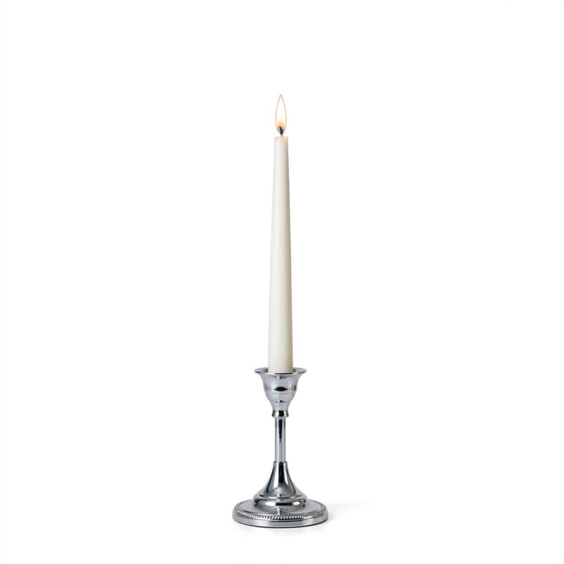 Lit white taper candle in a 5-inch silver candlestick holder on a white background - thumbnail number 3