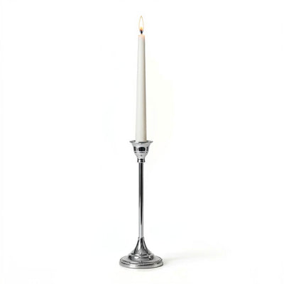 Lit white candle in a Taper Candlestick Silver 9" on a white background - thumbnail number 3