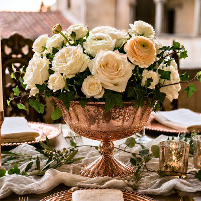 7" x 5.25" Mercury Glass Compote in Rose Gold filled with white roses on a dining table - thumbnail number 5