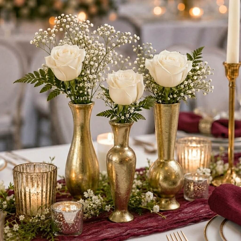 Henna Budvases with white roses and baby's breath on a table - thumbnail number 4