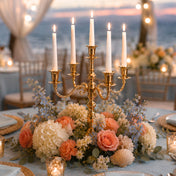 Lit 25-inch gold candelabra with white taper candles in a coastal floral centerpiece - thumbnail number 6