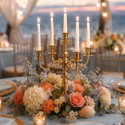 Lit 25-inch gold candelabra with white taper candles in a coastal floral centerpiece - thumbnail number 6