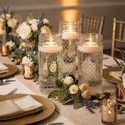 Floating white candles in the Hobnail Mason Jar Vase on an elegant wedding tablescape - thumbnail number 6