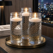 Floating candles in the Hobnail Mason Jar Vase on a brass tray with a city view - thumbnail number 7