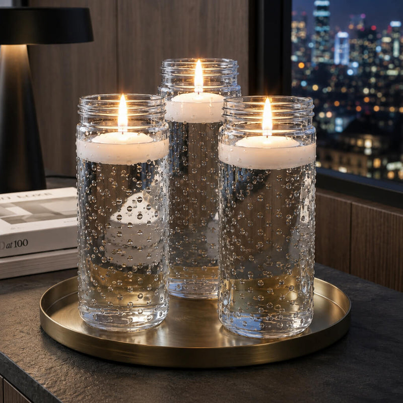 Floating candles in the Hobnail Mason Jar Vase on a brass tray with a city view - thumbnail number 7