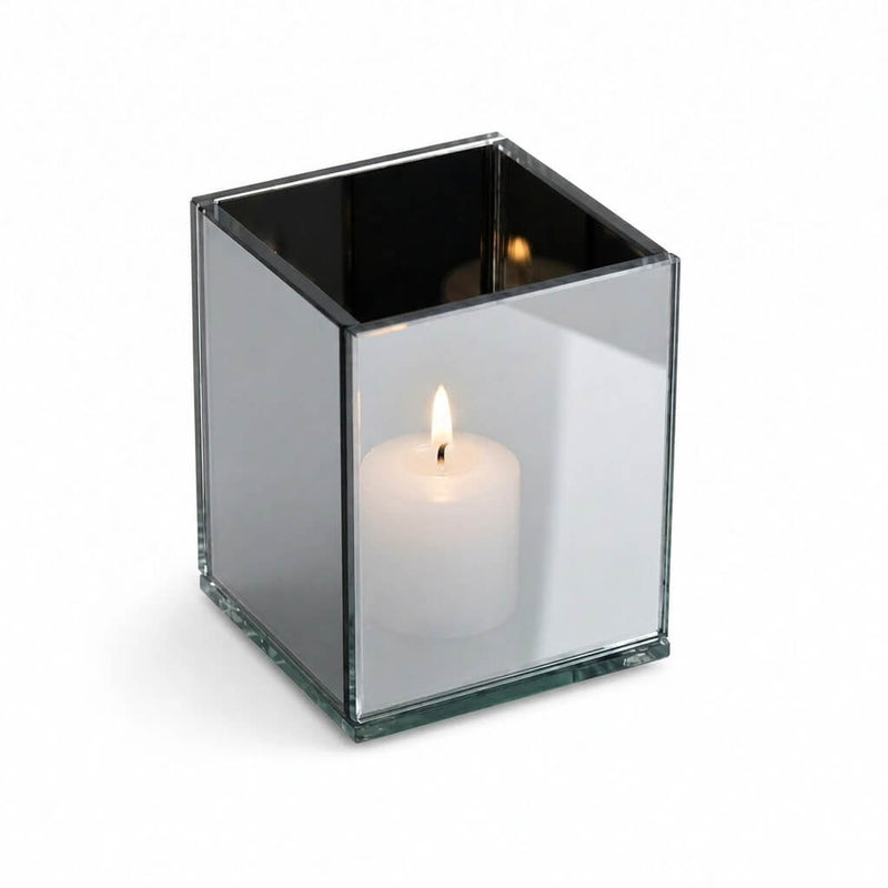 Square mirrored candle holder with a glowing white votive on a white background - thumbnail number 3
