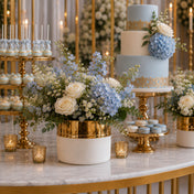 7.5" x 6.25" white and gold ceramic Claire vase with blue and white flowers on a dessert table - thumbnail number 6