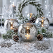 Winter scene with a Mercury Glass Silver Ivy Bowl, pinecones, and frosted greenery - thumbnail number 4
