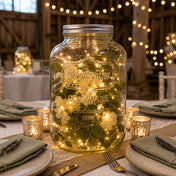 Two Gallon Yorkshire Glassware Mason Jar used as a decorative centerpiece with lights and greenery - thumbnail number 5