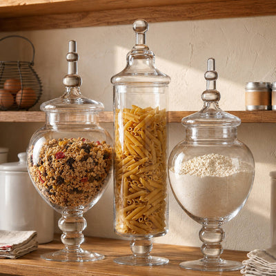 Apothecary jars holding pantry staples on wooden kitchen shelf - thumbnail number 6